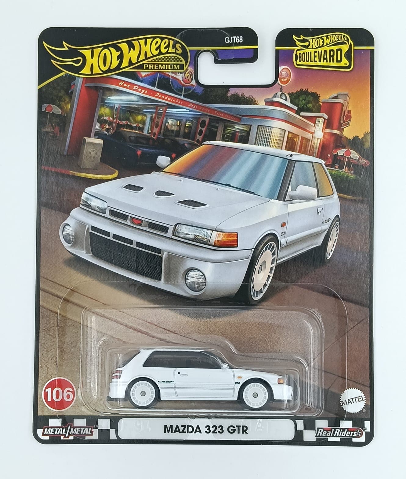 Hot Wheels Premium 1:64 MAZDA 323 GTR BOULEVARD #106 - Image 1